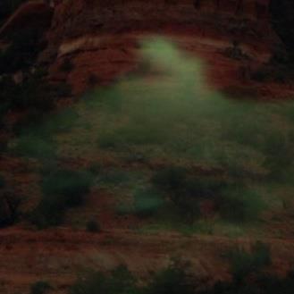 bell rock with green mist