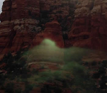 bell rock with green mist