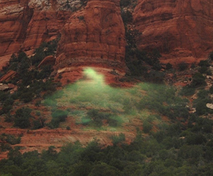 bell rock with green mist