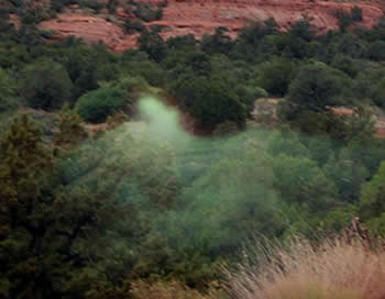 bell rock with green mist